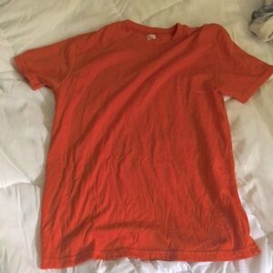 Plain orange shirt. No stains